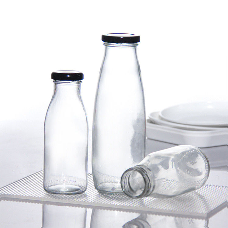 OEM 250 ml 500 ml 1000 ml 2 litros Botellas de vidrio de leche Jar Grado alimenticio forma redonda