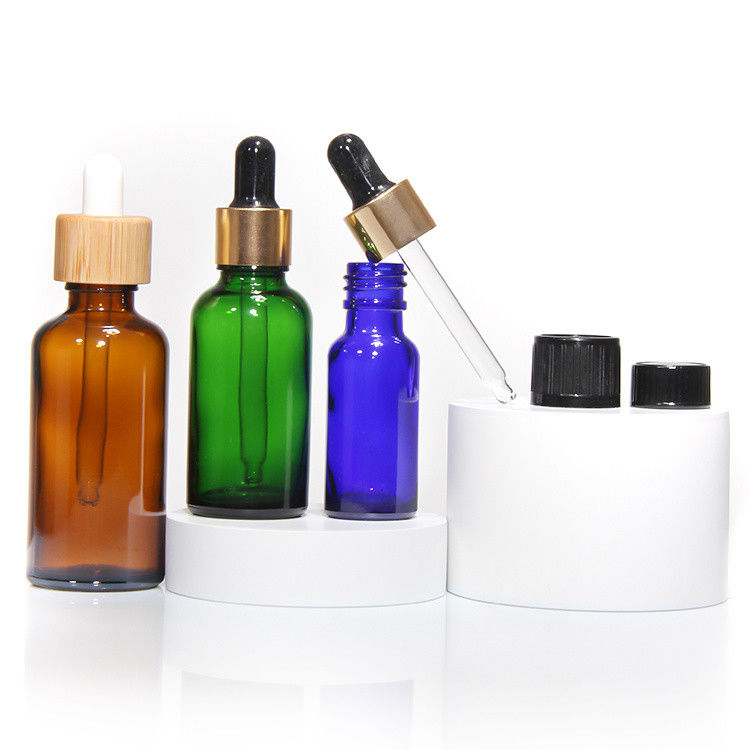Precio de fábrica Botellas de tintura a granel Botellas de tintura de vidrio con tapa de madera de plástico