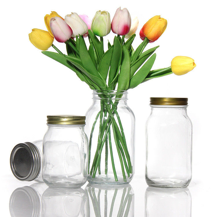 Producido varios tamaños de vidrio de cocina personalizado almacenamiento de alimentos de vidrio Mason Jar para dulces de galletas de especias