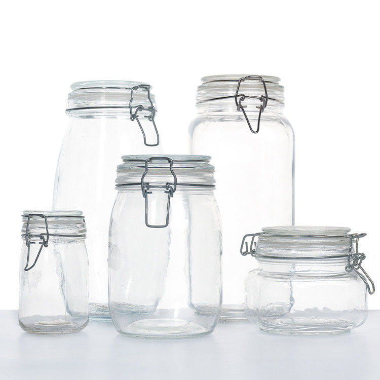 Uso de fábrica de alimentos 1 oz 4 oz 8 oz de forma redonda Contenedor de almacenamiento vacío transparente Jarras de vidrio de alimentos con tapa de clip
