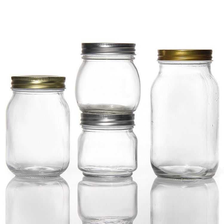 Diseño personalizado 8 Oz 16 Oz Contenedor de almacenamiento de alimentos Jarrón de vidrio Mason con tapas