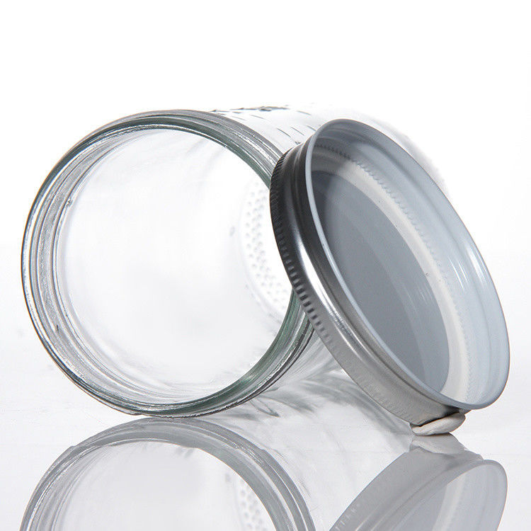 Diseño personalizado 8 Oz 16 Oz Contenedor de almacenamiento de alimentos Jarrón de vidrio Mason con tapas