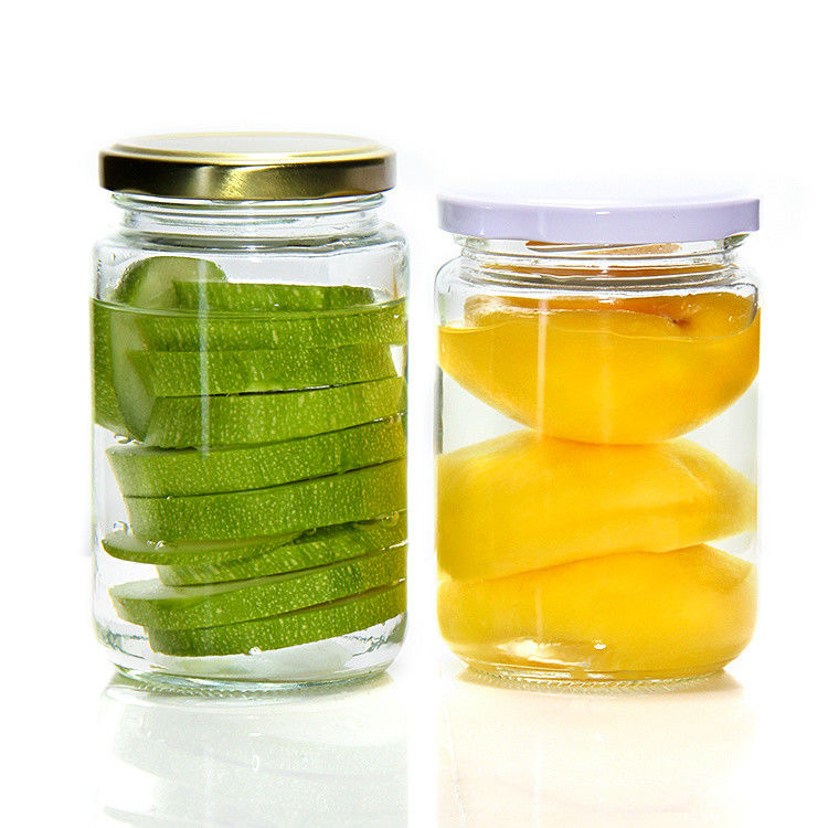 Contenedores de vidrio transparente redondo a granel Jarrillos de vidrio contenedores de bocadillos para mermelada de miel 32 oz