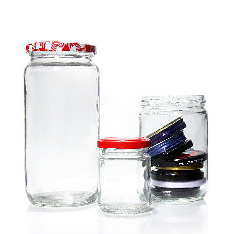 Contenedores de vidrio transparente redondo a granel Jarrillos de vidrio contenedores de bocadillos para mermelada de miel 32 oz