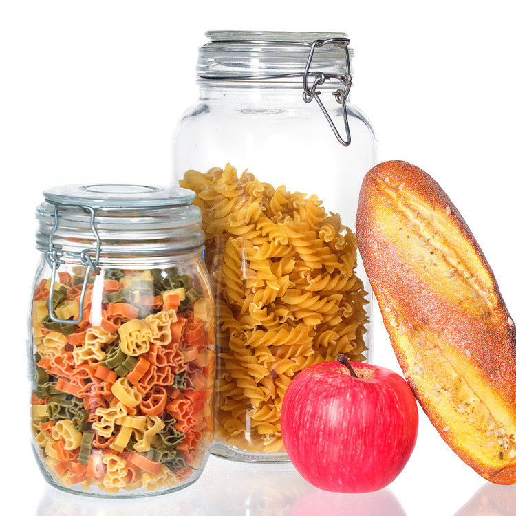 Envases de cristal redondos a medida 35ml 100ml 8Oz 10Oz 12Oz Jam de pepinos picles Jarrones de almacenamiento de vidrio para almacenar alimentos