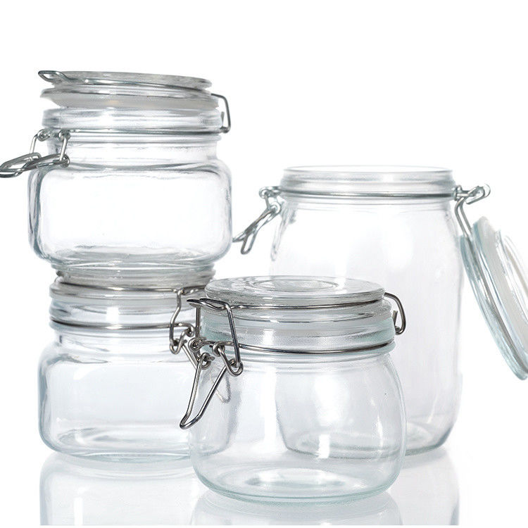 Envases de cristal redondos a medida 35ml 100ml 8Oz 10Oz 12Oz Jam de pepinos picles Jarrones de almacenamiento de vidrio para almacenar alimentos