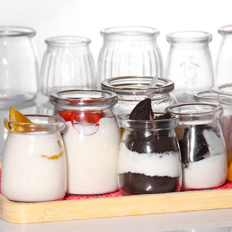 Botella de yogur de vidrio de 100 ml envasado Jarrita de pudín Jelly Mousse Taza de postre y botella de leche fresca con tapa de plástico