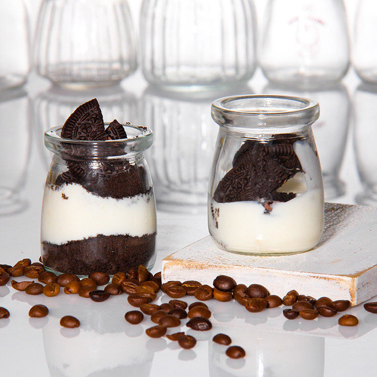 Botella de yogur de vidrio de 100 ml envasado Jarrita de pudín Jelly Mousse Taza de postre y botella de leche fresca con tapa de plástico