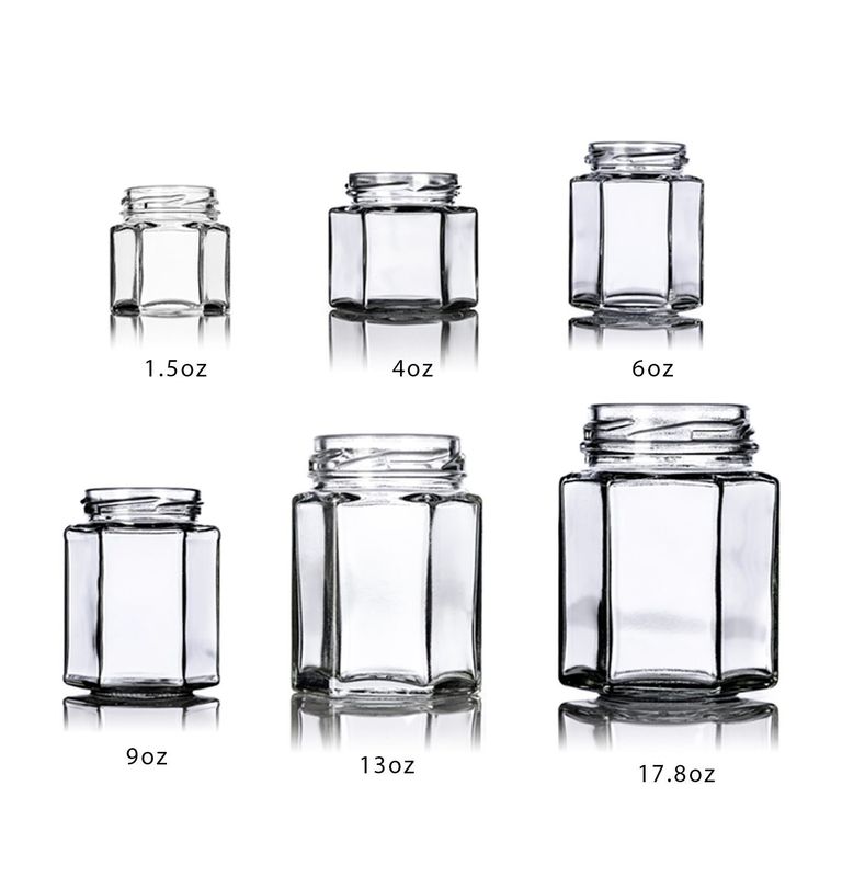 Logotipo personalizado 100 ml 180 ml 280 ml 380 ml Confección de salsa de mermelada Botellas de vidrio transparentes Jar de vidrio hexagonal de miel