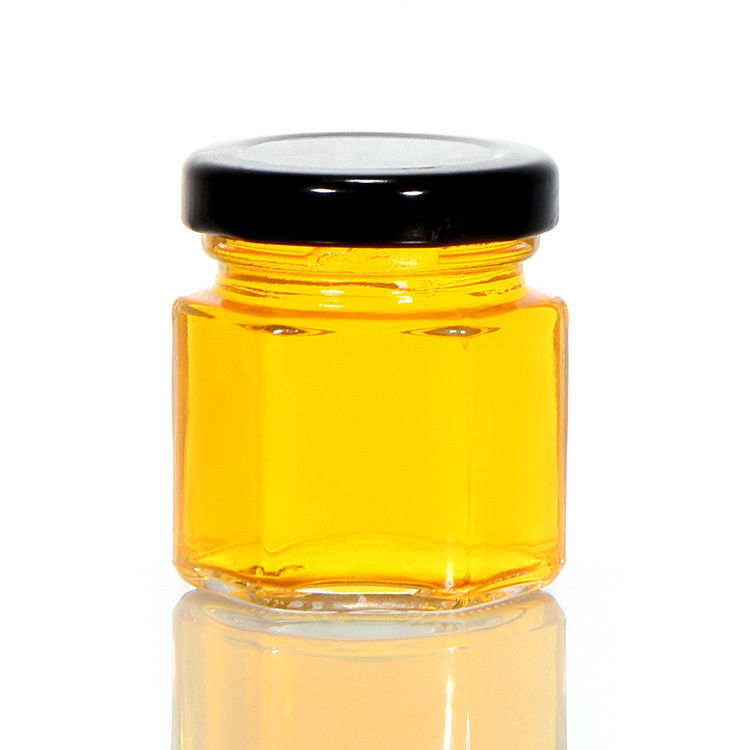 Envases redondos de vidrio transparentes de 100 ml para almacenamiento de miel envases de alimentos con tapas metálicas