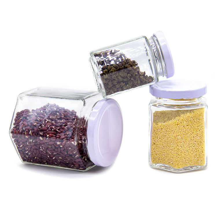 Envases redondos de vidrio transparentes de 100 ml para almacenamiento de miel envases de alimentos con tapas metálicas