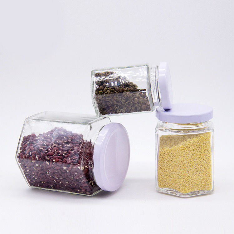 Envases redondos de vidrio transparentes de 100 ml para almacenamiento de miel envases de alimentos con tapas metálicas