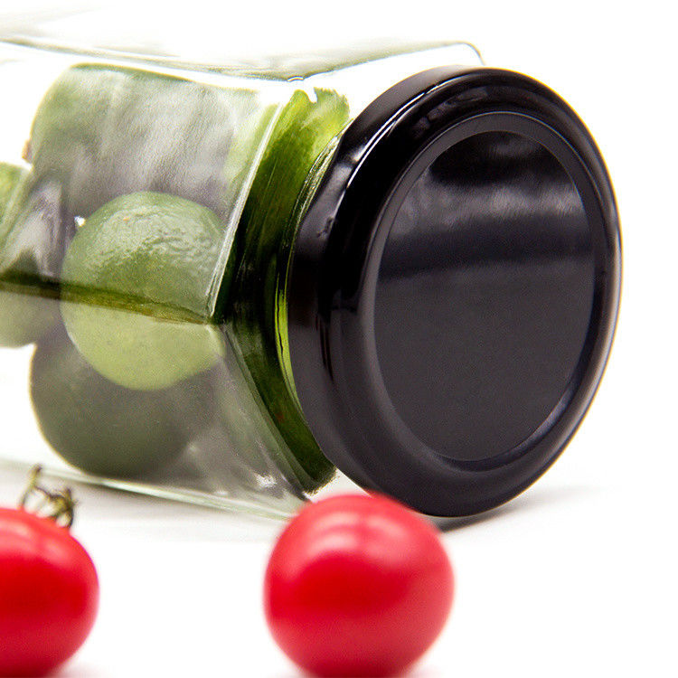 Botellas de vidrio de miel vacías con tapas de oro con tapas