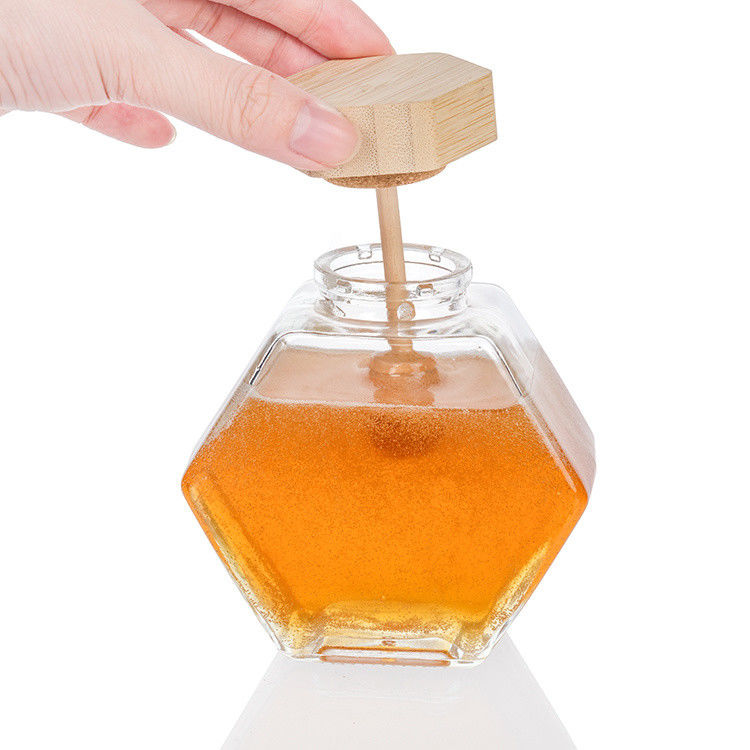 Forma hexagonal Vidrio transparente Jarrón de almacenamiento de alimentos de cocina con tapa de acero inoxidable o tapa transparente