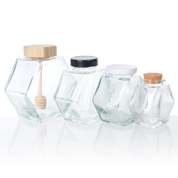 Forma hexagonal Vidrio transparente Jarrón de almacenamiento de alimentos de cocina con tapa de acero inoxidable o tapa transparente