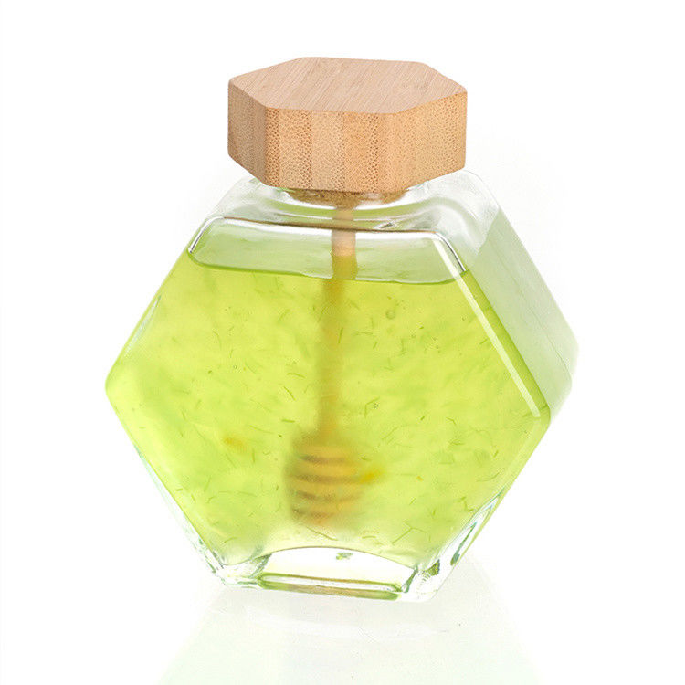 Forma hexagonal Vidrio transparente Jarrón de almacenamiento de alimentos de cocina con tapa de acero inoxidable o tapa transparente