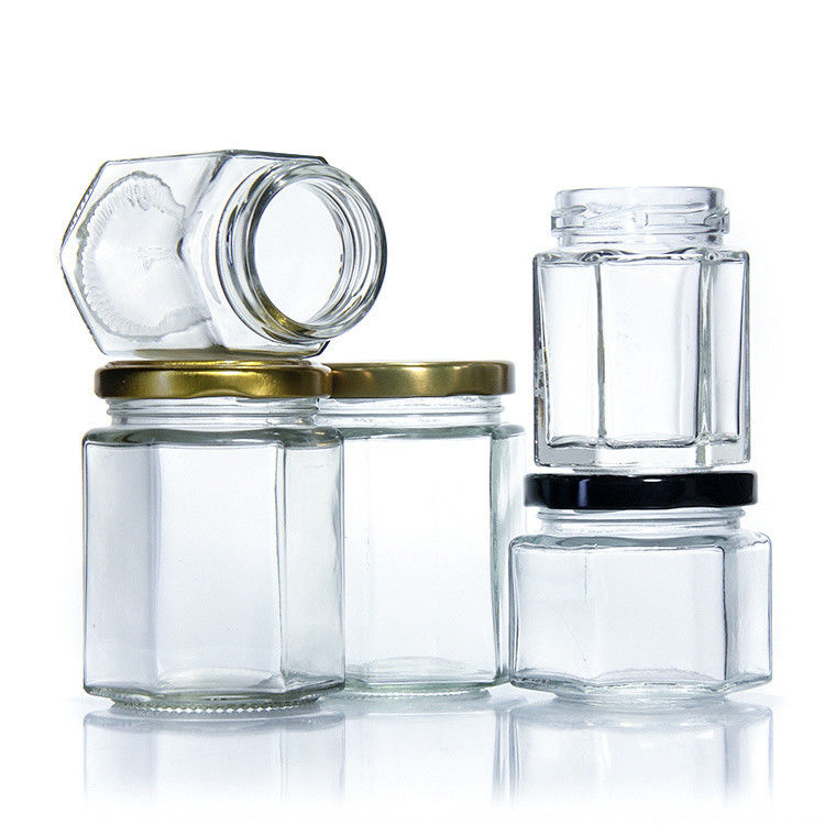 Contenedor de almacenamiento transparente sellado de diferentes tamaños Jarrón de vidrio hexagonal vacío para cocina