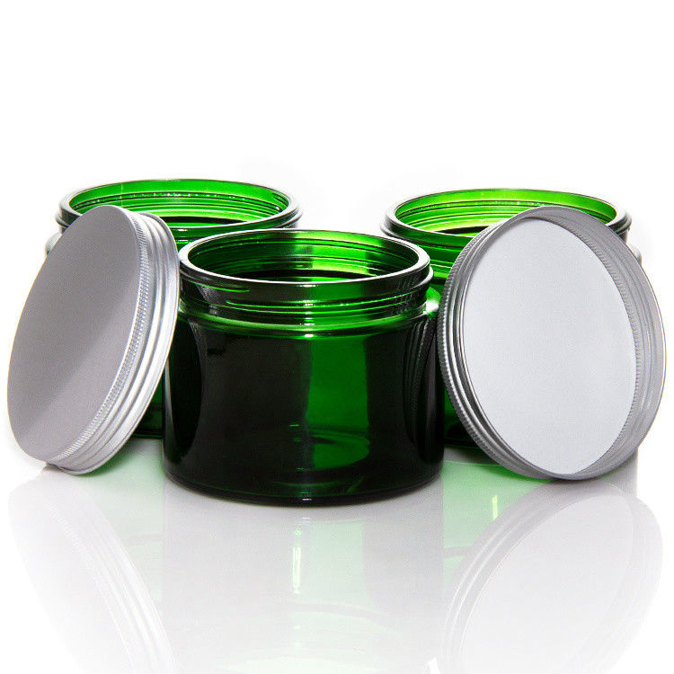 Jarrones de velas de vidrio transparente de color verde vacío con tapa ODM