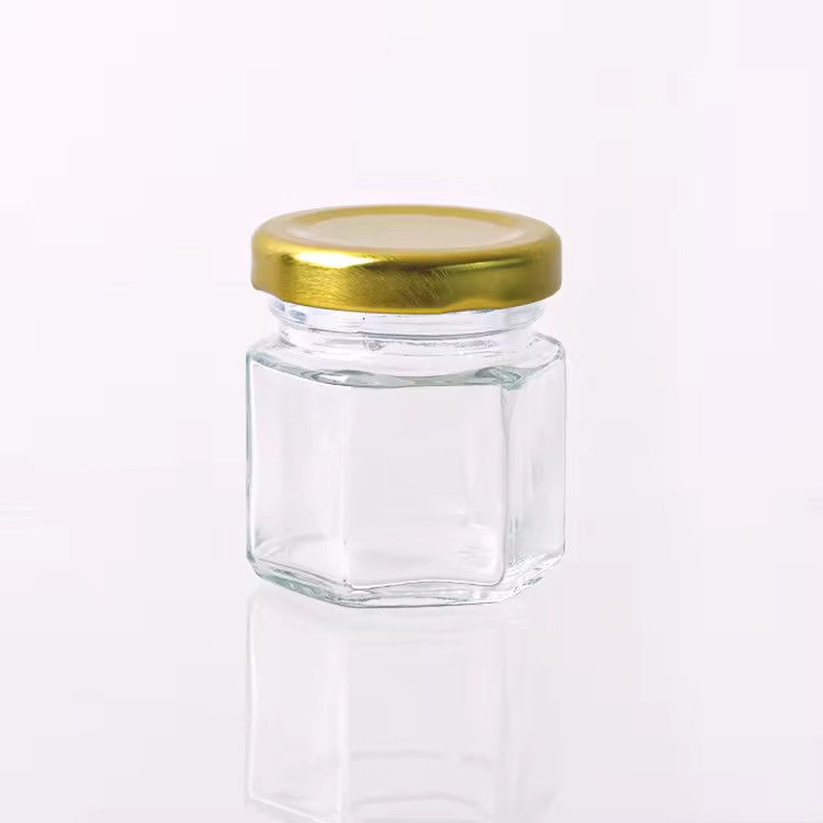Etiqueta hexagonal personalizada 100ml 180ml 380ml Tarro de vidrio de miel para mermelada de frutas de oliva
