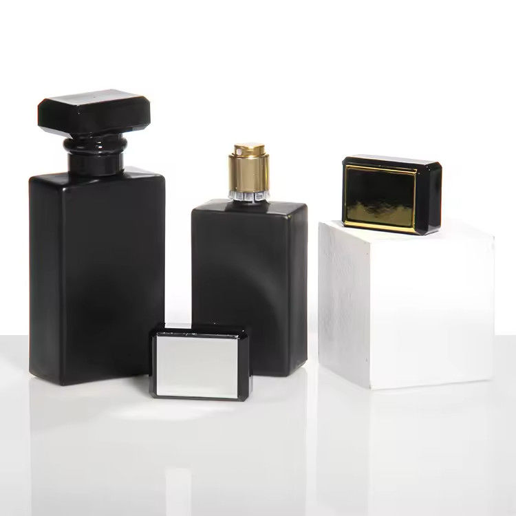 Botella de perfume de lujo de fabricación a medida mujer 30 ml 50 ml 100 ml botella de perfume de spray de vidrio vacío recargable