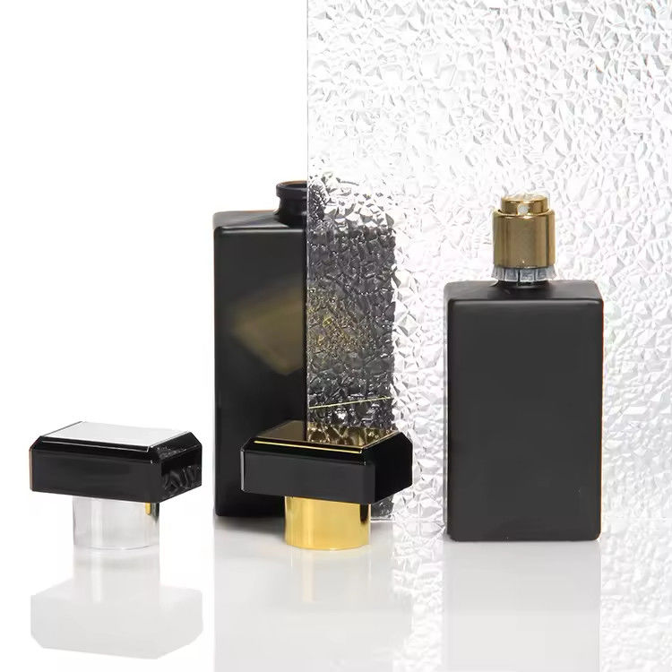 Botella de perfume de lujo de fabricación a medida mujer 30 ml 50 ml 100 ml botella de perfume de spray de vidrio vacío recargable