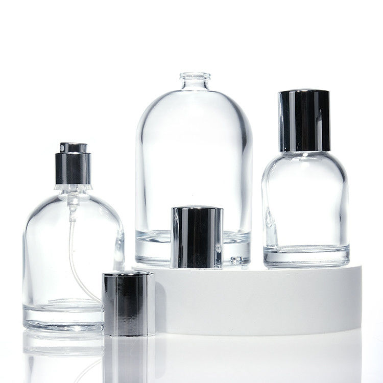 Logotipo personalizado de cilindro 30ml 50ml 100ml Botella de perfume de vidrio redondo vacío con tapa y caja magnética
