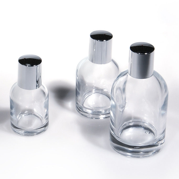 Logotipo personalizado de cilindro 30ml 50ml 100ml Botella de perfume de vidrio redondo vacío con tapa y caja magnética
