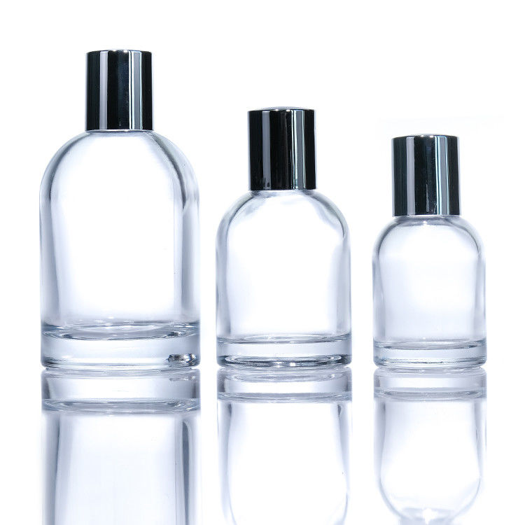 Logotipo personalizado de cilindro 30ml 50ml 100ml Botella de perfume de vidrio redondo vacío con tapa y caja magnética