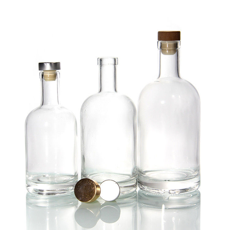 Botellas de vidrio transparente para bebidas de vino Bebida con tapón de corcho Botellas de tapa hermética Proveedor 500ml 750ml