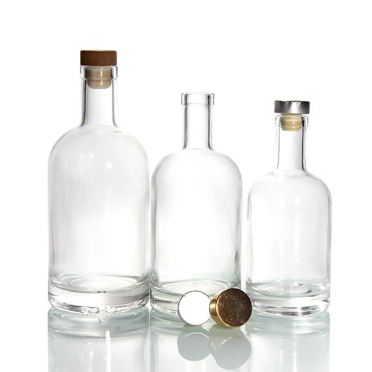 Botellas de vidrio transparente para bebidas de vino Bebida con tapón de corcho Botellas de tapa hermética Proveedor 500ml 750ml