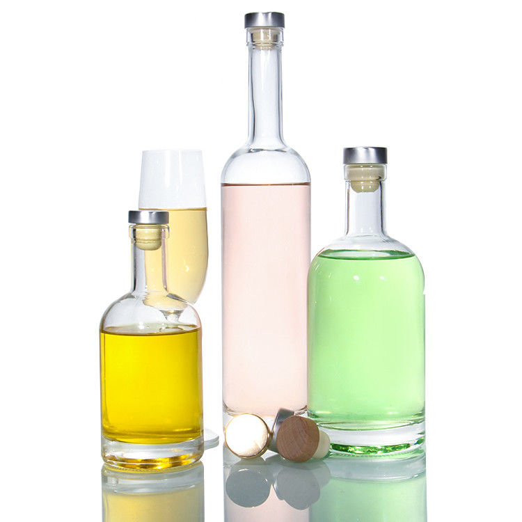 Botellas de vidrio transparente para bebidas de vino Bebida con tapón de corcho Botellas de tapa hermética Proveedor 500ml 750ml