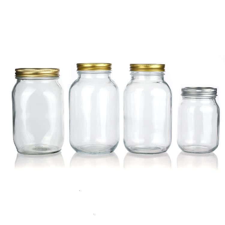 Diseño personalizado 8 Oz 16 Oz Contenedor de almacenamiento de alimentos Jarrón de vidrio Mason con tapas
