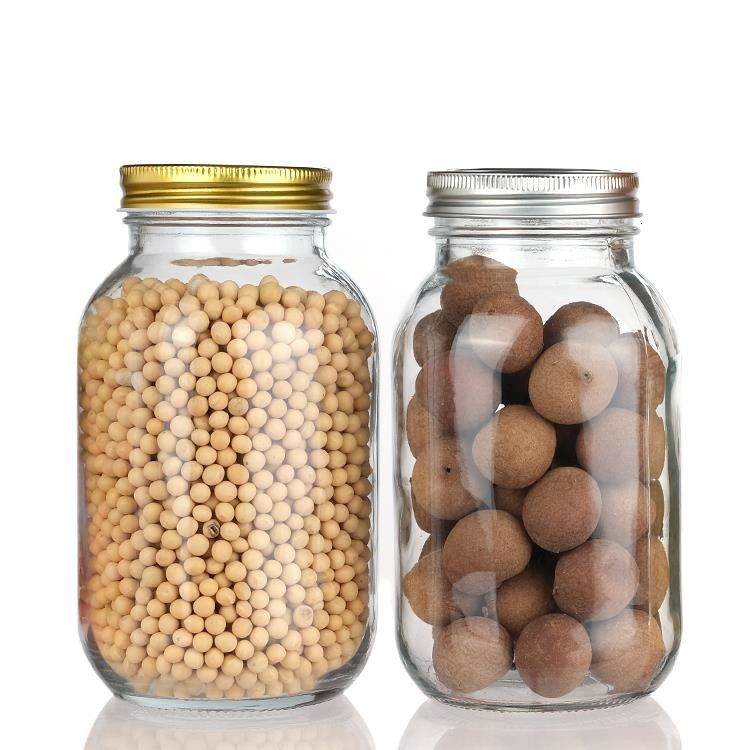 Diseño personalizado 8 Oz 16 Oz Contenedor de almacenamiento de alimentos Jarrón de vidrio Mason con tapas