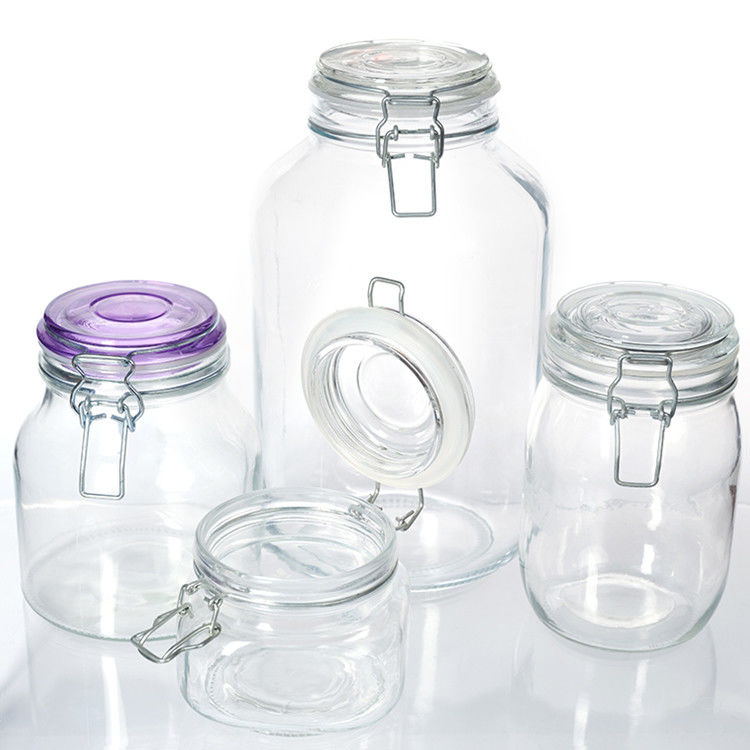 Envase de vidrio de venta al por mayor Especias claras Café galleta de vidrio Jar de vidrio de almacenamiento de alimentos Jar con tapa de vidrio de sello