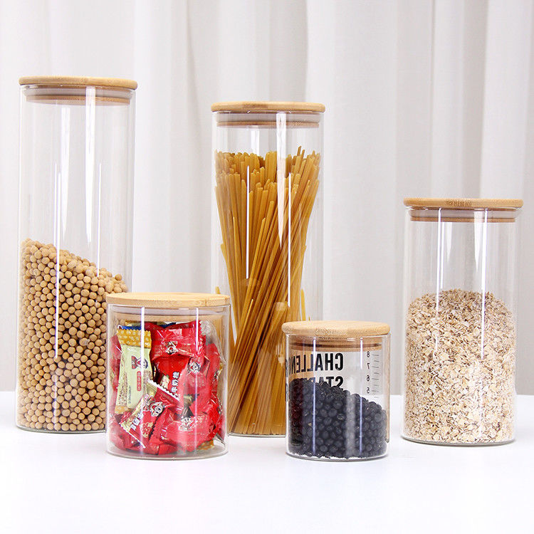 Gran cantidad de diferentes tamaños de borosilicato de vidrio Jar de almacenamiento vacío de rosca de vidrio con tapa superior de rosca