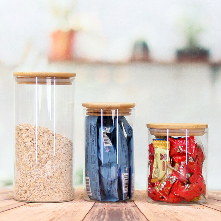 Gran cantidad de diferentes tamaños de borosilicato de vidrio Jar de almacenamiento vacío de rosca de vidrio con tapa superior de rosca