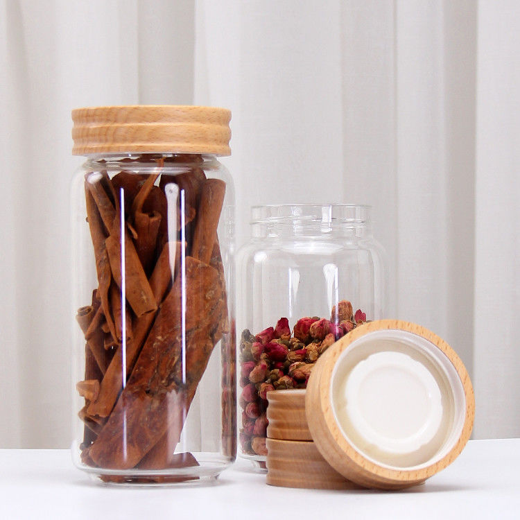 Gran cantidad de diferentes tamaños de borosilicato de vidrio Jar de almacenamiento vacío de rosca de vidrio con tapa superior de rosca
