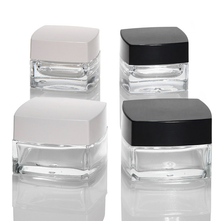 Embalaje de la botella de cosmética vacía 30 ml 50 ml 100 ml Vidrio mate Jarrón de crema para el cuidado de la piel con tapa blanca y negra
