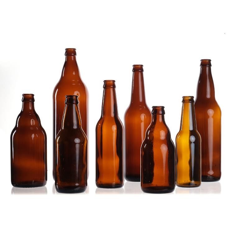 Venta al por mayor 330ml vacíos 33cl 12oz de soda o jugo botellas de vidrio de cerveza clara con tapa