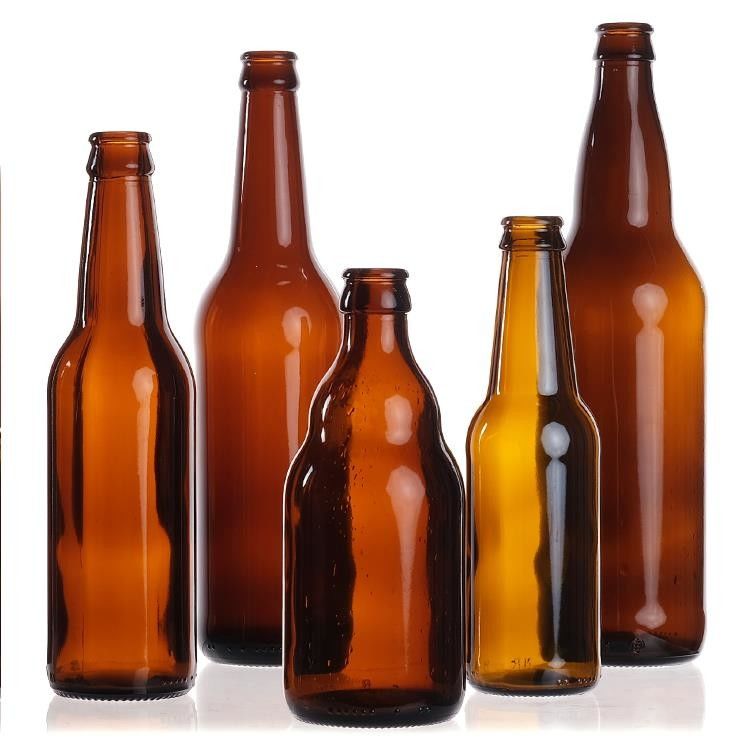 Venta al por mayor 330ml vacíos 33cl 12oz de soda o jugo botellas de vidrio de cerveza clara con tapa