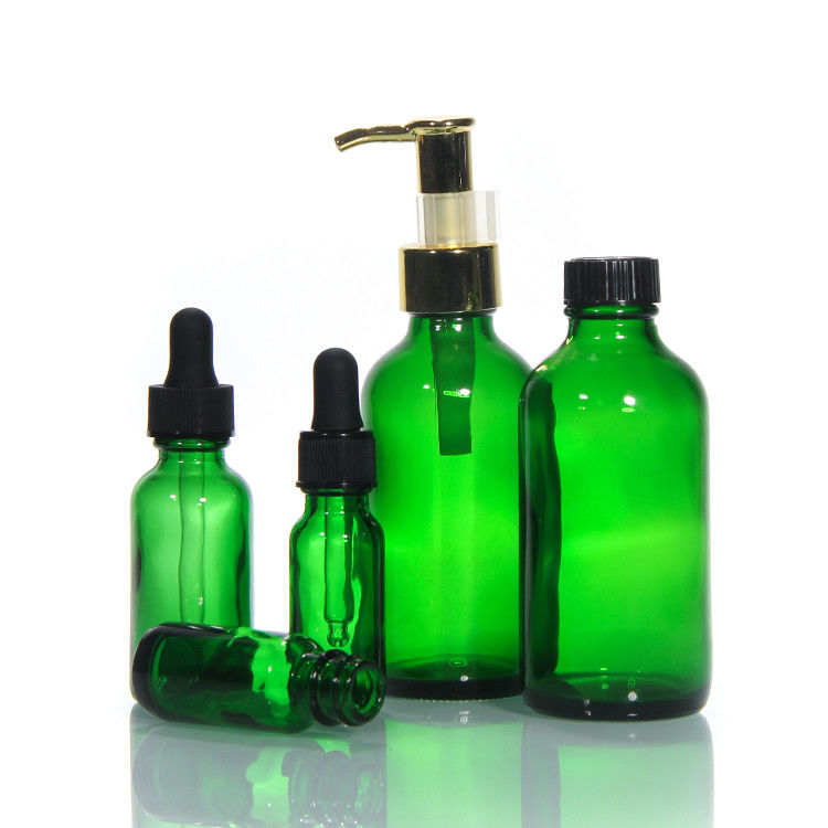 Botella de vidrio de lujo de color vacío Botella de vidrio con bomba de loción Botellas de vidrio cosméticos