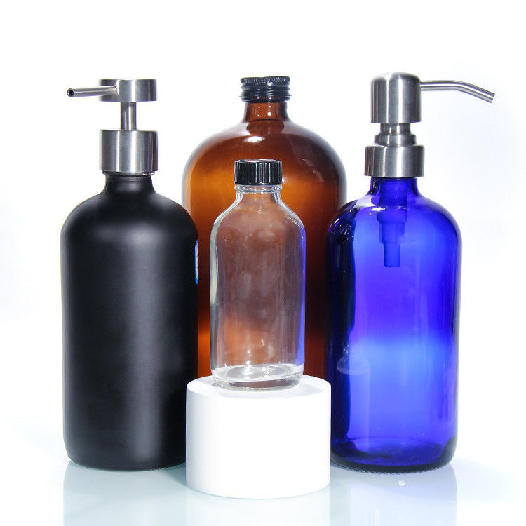 Botella de vidrio de lujo de color vacío Botella de vidrio con bomba de loción Botellas de vidrio cosméticos