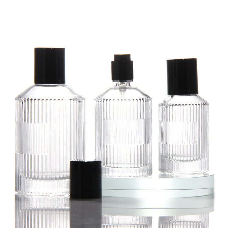 Botella de perfume transparente de cilindro OEM Botella de perfume de vidrio de 50 ml con bombilla de pulverización de caja regalo