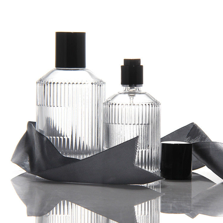 Botella de perfume transparente de cilindro OEM Botella de perfume de vidrio de 50 ml con bombilla de pulverización de caja regalo