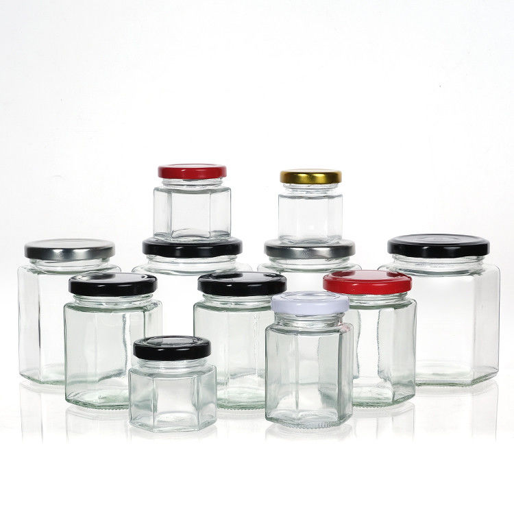 Botella de miel vacía de vidrio Mini Jar de miel hexagonal 500ml 380ml 180ml 90ml 45ml con tapa