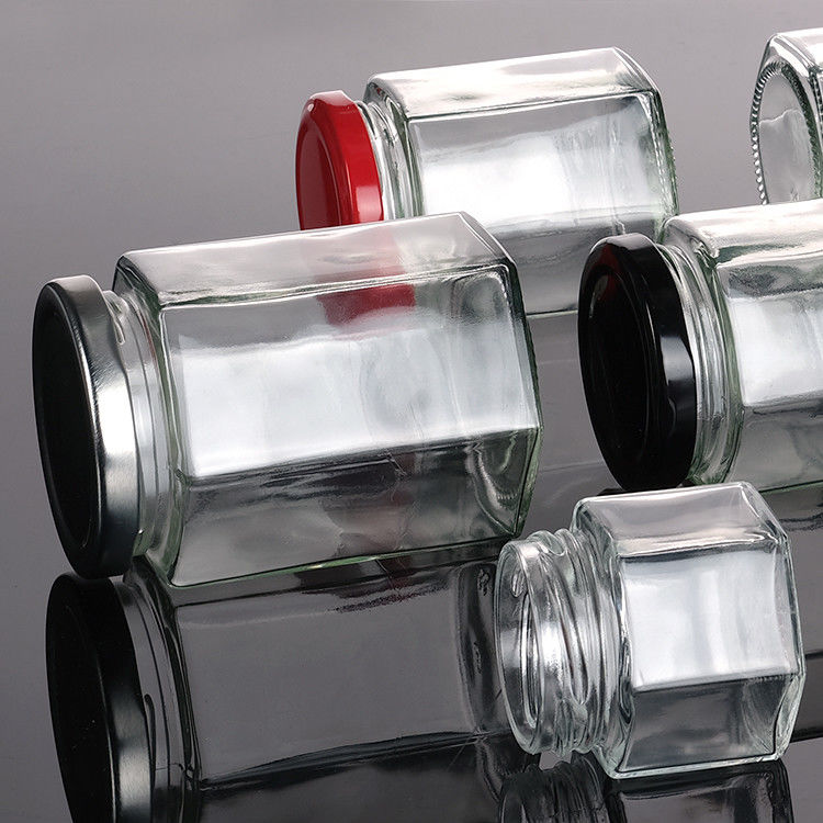Botella de miel vacía de vidrio Mini Jar de miel hexagonal 500ml 380ml 180ml 90ml 45ml con tapa