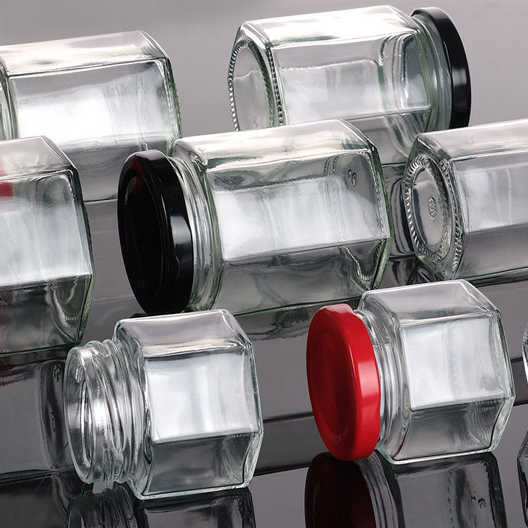 Botella de miel vacía de vidrio Mini Jar de miel hexagonal 500ml 380ml 180ml 90ml 45ml con tapa