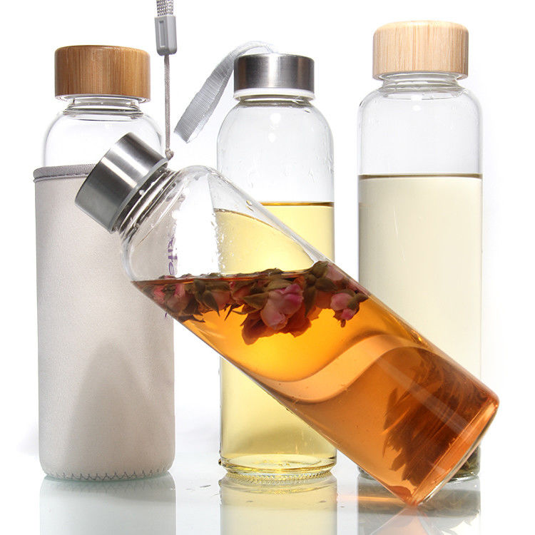 Botellas de vidrio Eco-friendly Bpa libre tapa de acero inoxidable 500ml Botella de agua de vidrio para beber