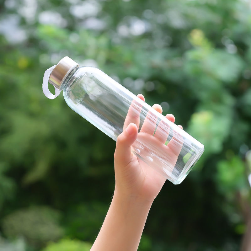 Botella de agua de vidrio de alto borosilicato con manga de silicona
