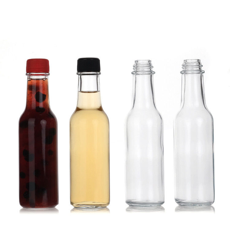 Fábrica mayorista 5 oz 8 oz botellas Woozy salsa de ketchup pimienta botella de vidrio con tapa de Pp